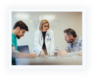 Clinicians reviewing care together