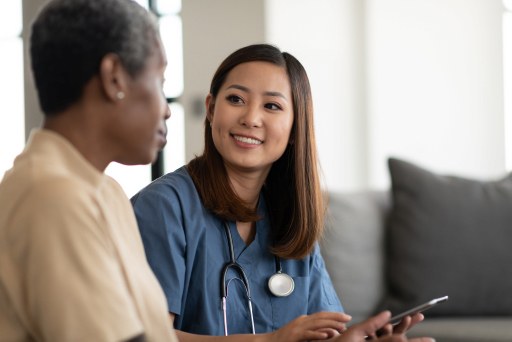 Caregiver talking with a resident