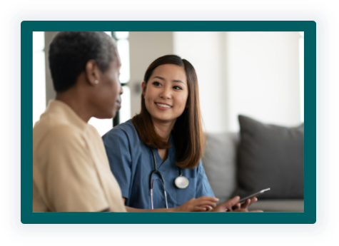 Caregiver talking with a resident